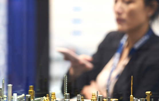 Woman looking at parts in display